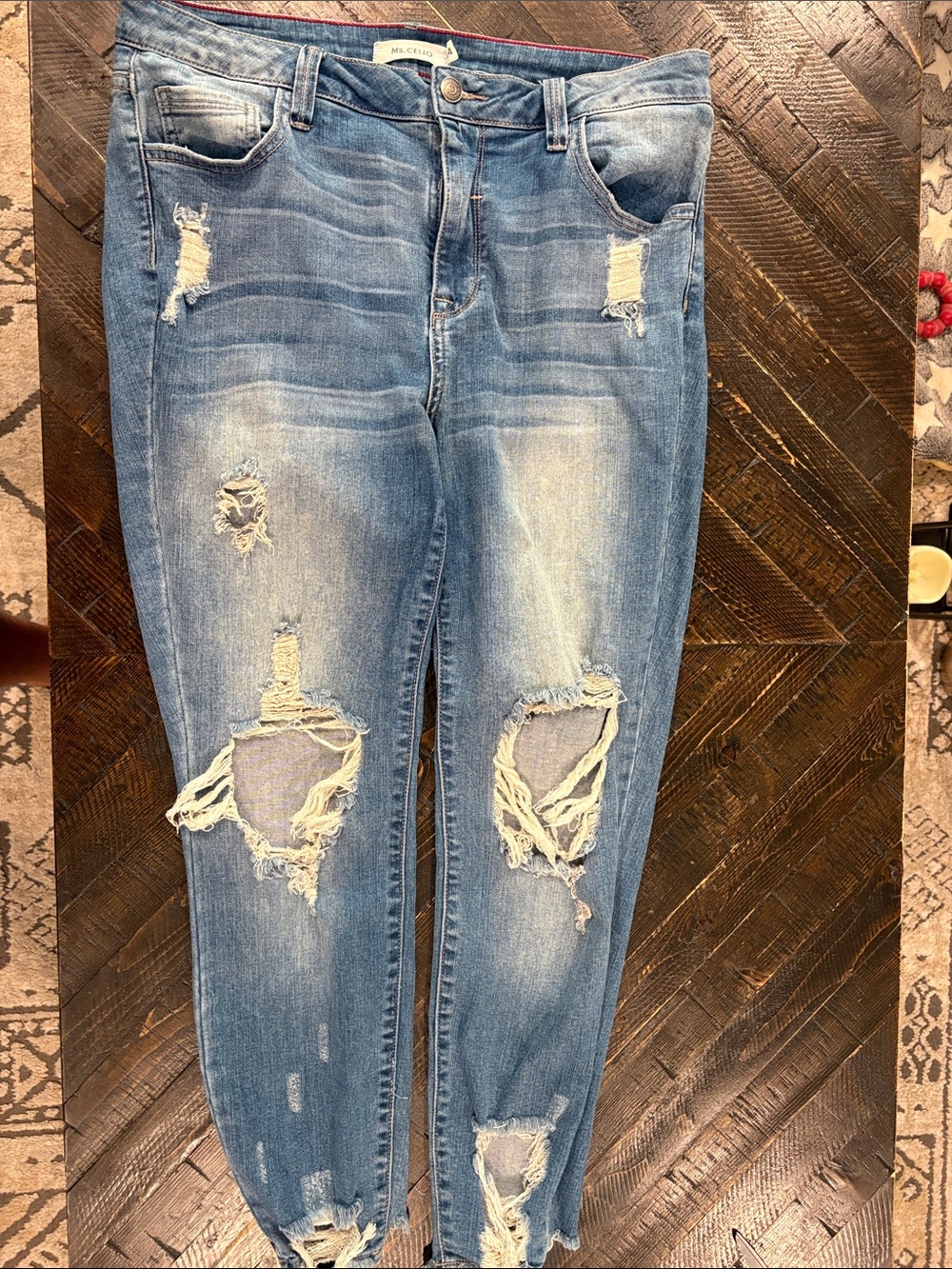 Women’s Distressed Boyfriend Jeans in Light Blue